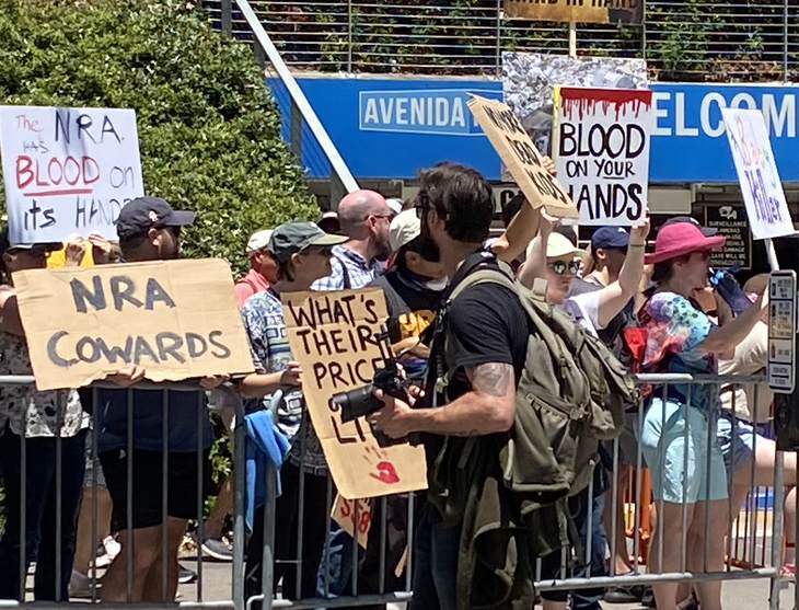 An up close (and birds-eye) look at the protests of the NRA's Annual Meeting